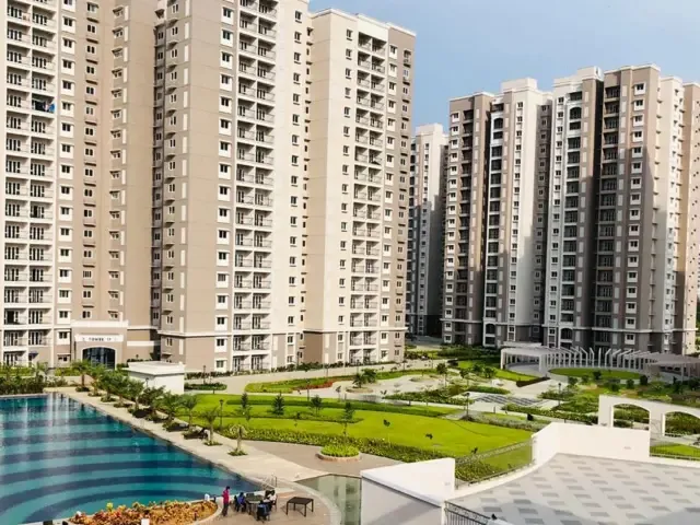 Residential towers and landscaping at Prestige Song of The South near Begur Road
